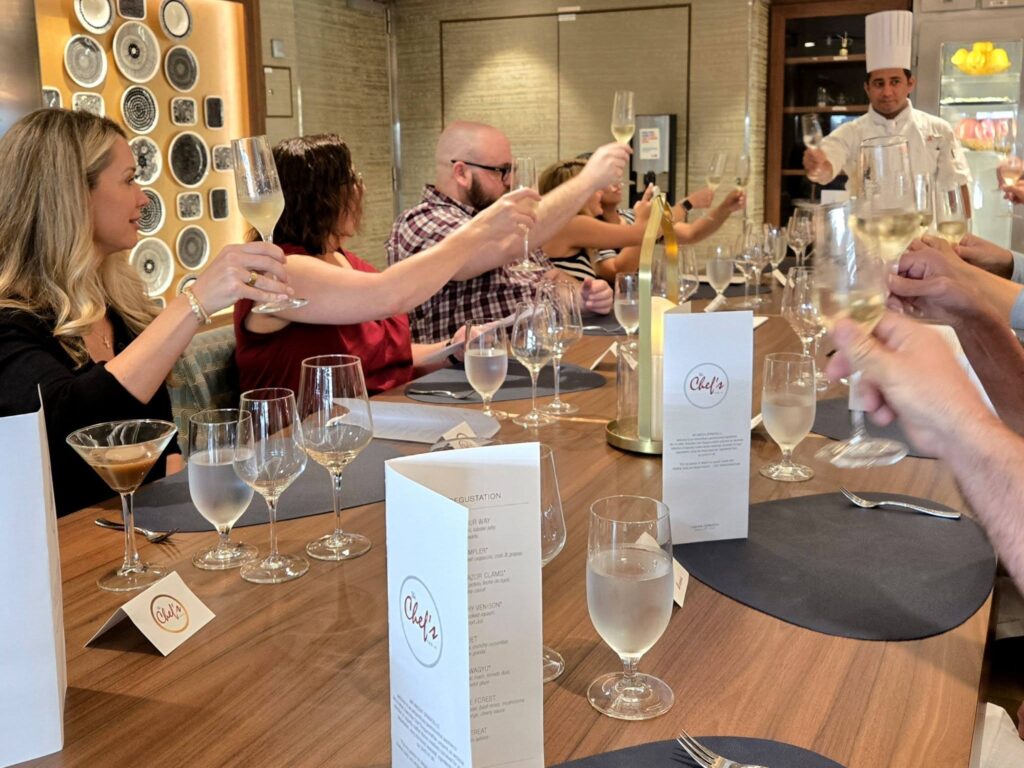 A limited-seat culinary experience with champagne, a live galley tour, and a multicourse Chef’s Table dinner hosted by the Master Executive Chef.